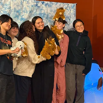 Students posing for a photo at Midnight Breakfast 2025