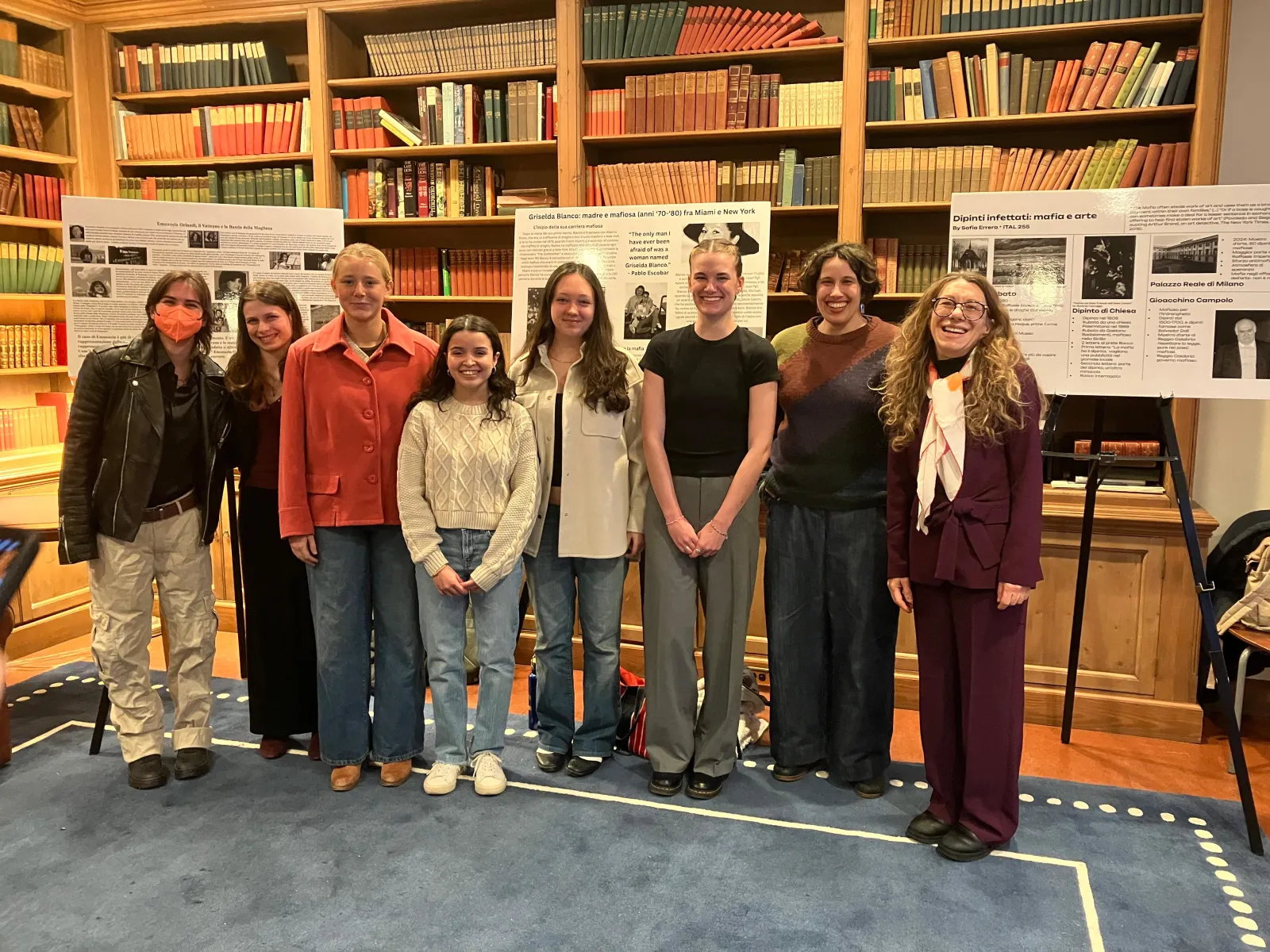 Students in front of posters from Mafia and Organized Crime course December 2025