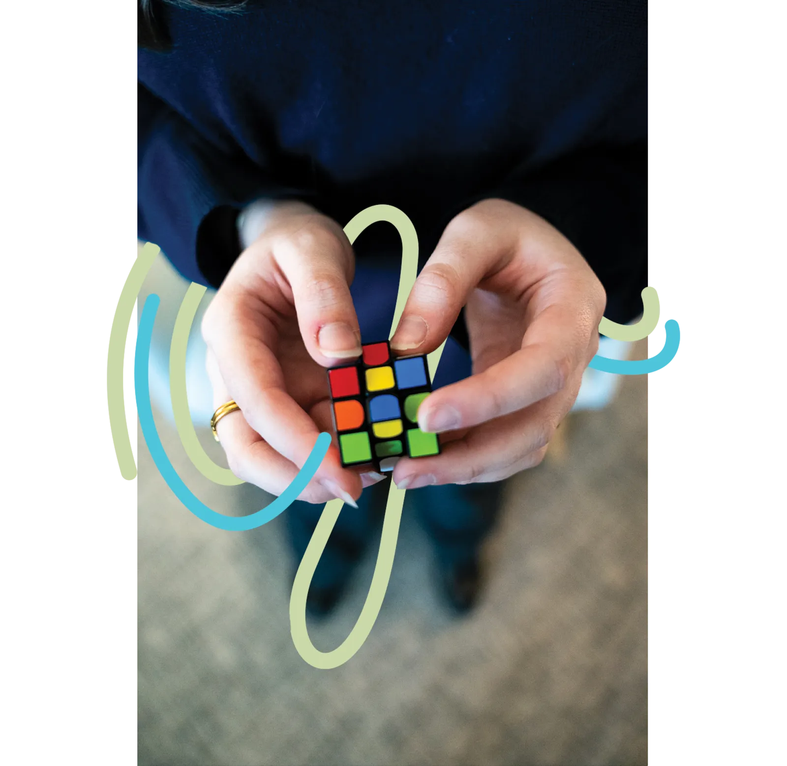 Sasha holding a fidget toy