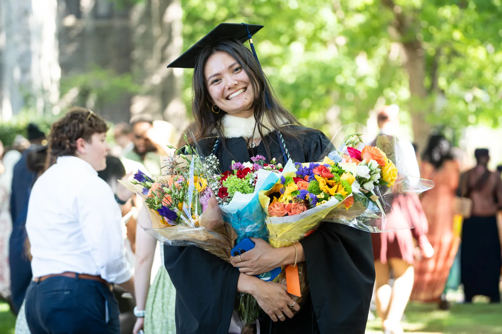 student with flowers