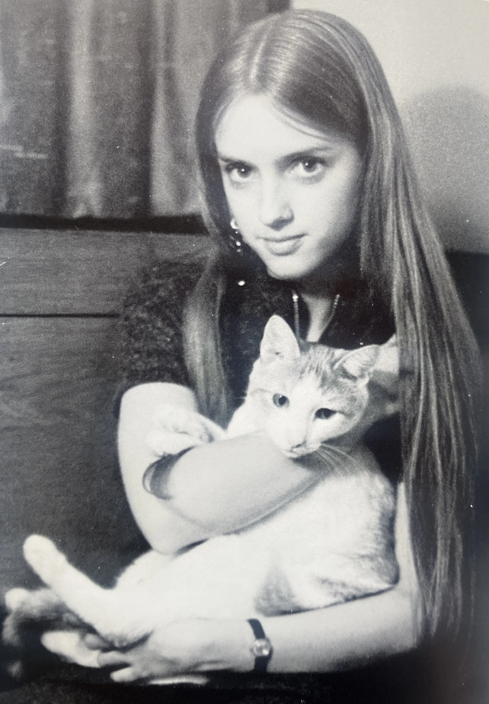Terry Graybill in the 1971 yearbook with her cat Assurbanipal