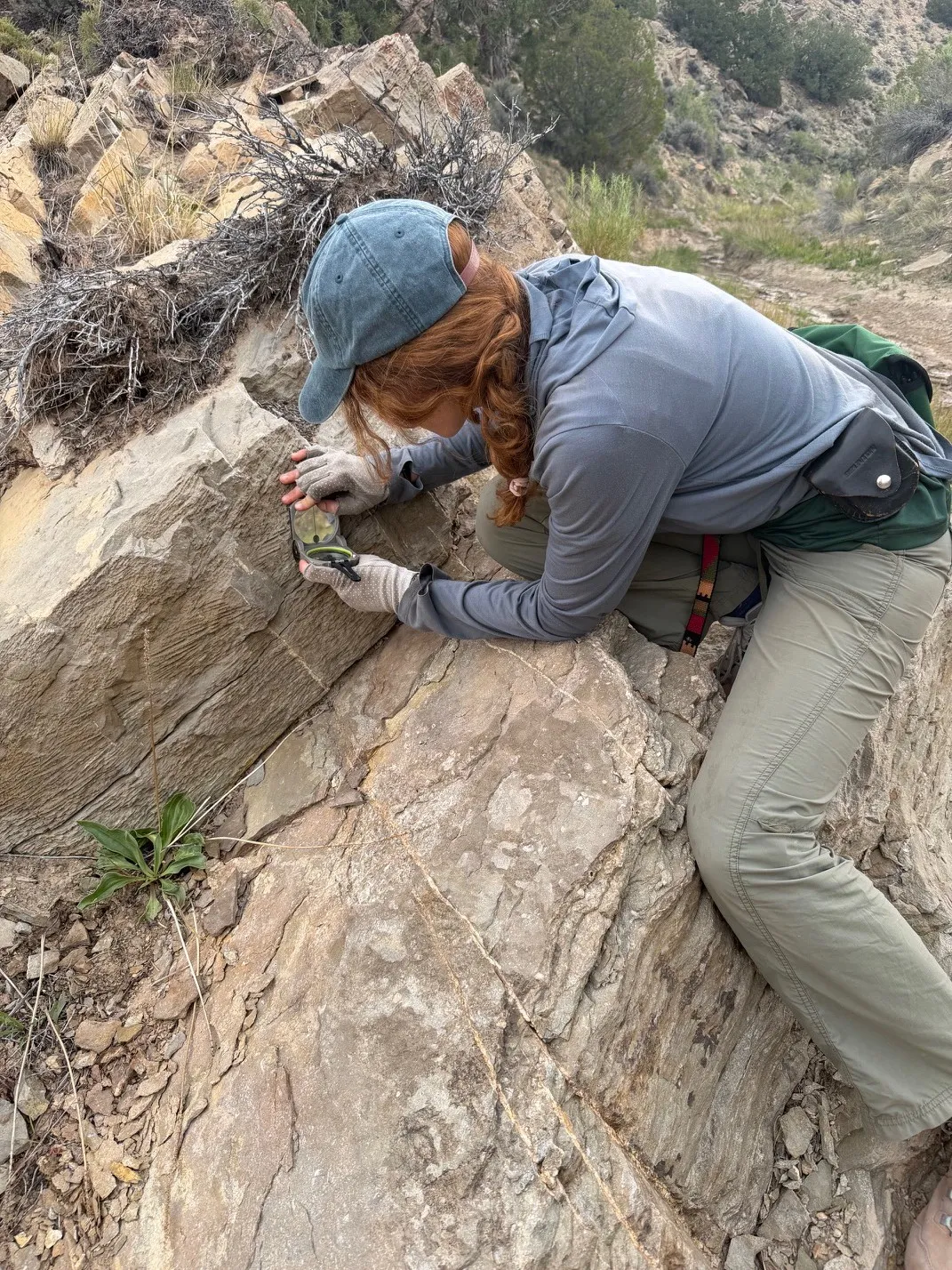 A student doing field work in the Utah desert