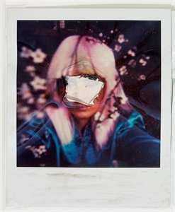 Gouged polaroid self-portrait of artist