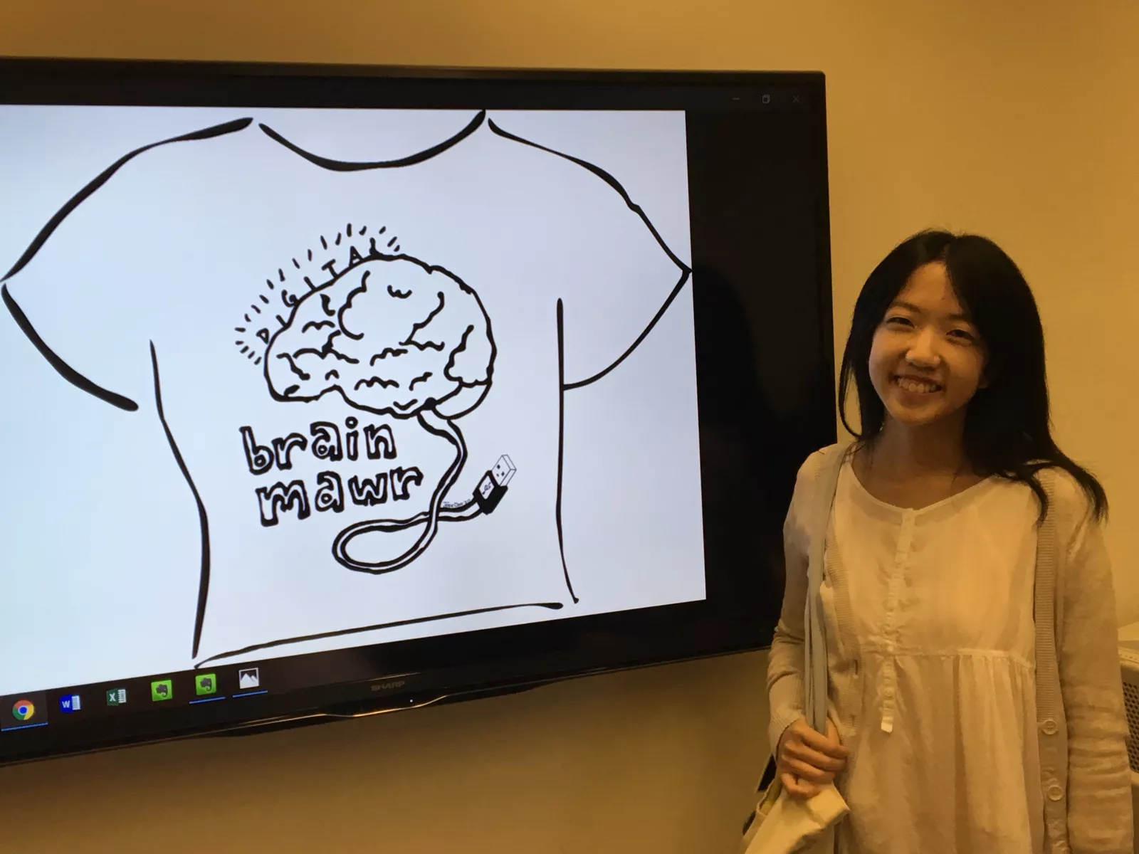 Jessie Chen ('20) stands next to design.