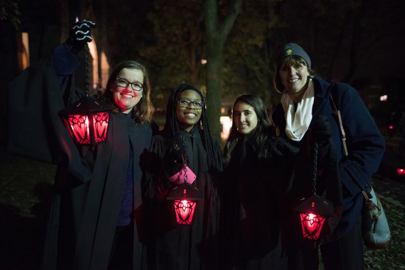 Lantern Night 2017 - Three students holding red lanterns and taking picture with President Kim…