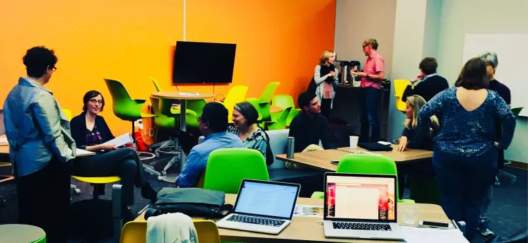 Discussions in brightly-colored room